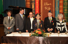 12 new signers sign the Book of Life